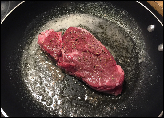 A 10oz-ish beef tenderloin sizzing in butter